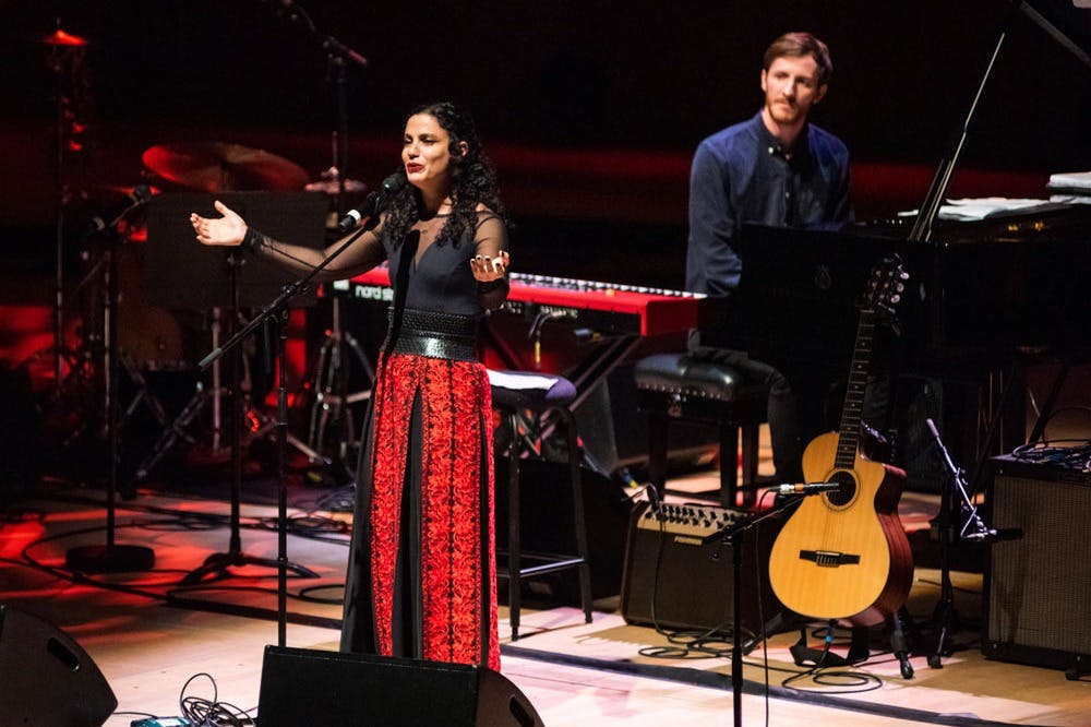 Emel Mathlouthi performs at the Woman Life Freedom concert.
